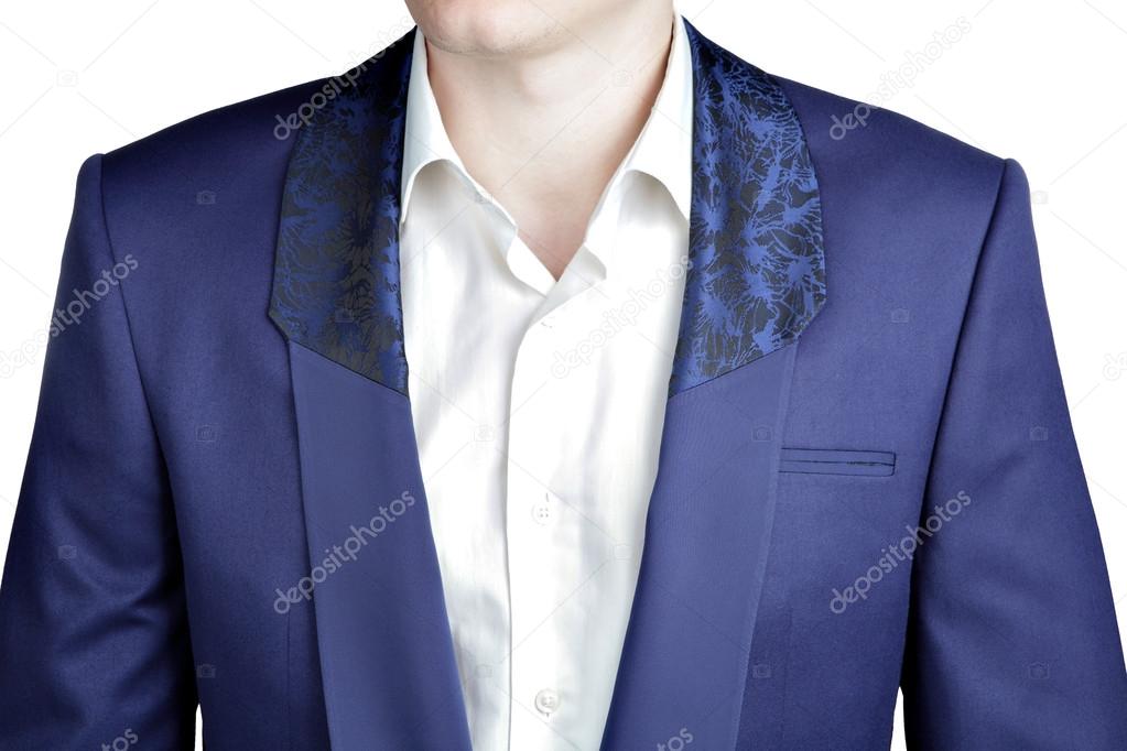Closeup deep blue blazer, shawl collar with a wide lapel.