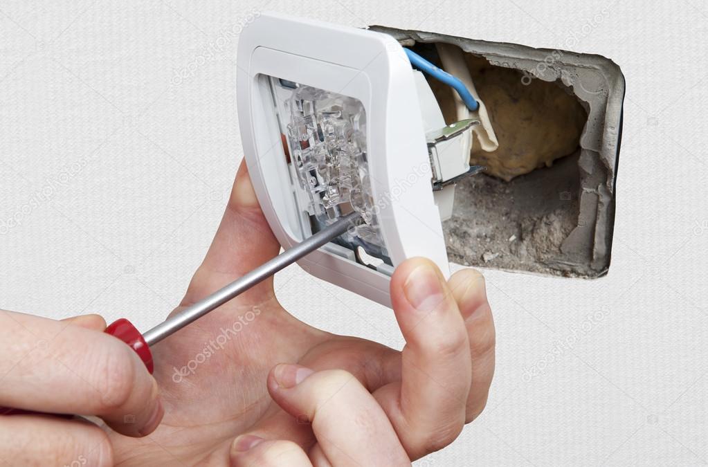 Replace wall light switch, closeup. Stock Photo by ©grigvovan 96420804