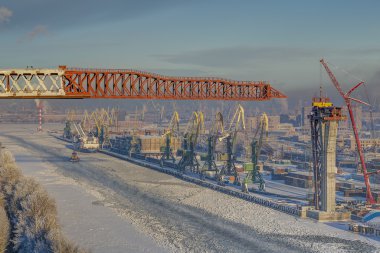 Sea channel and cargo port, Saint-Petersburg, Russia, winter, top view. clipart