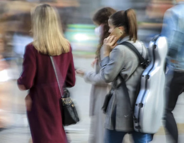 Motion blur strength, Woman in motion with musical instrument