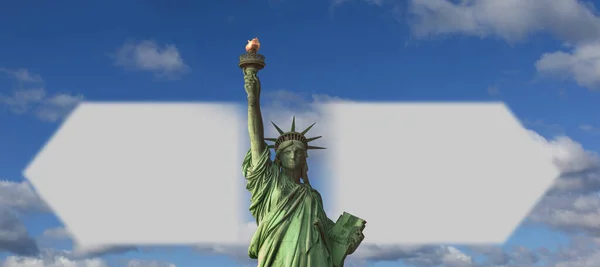 Statue of Liberty and arrows against the sky