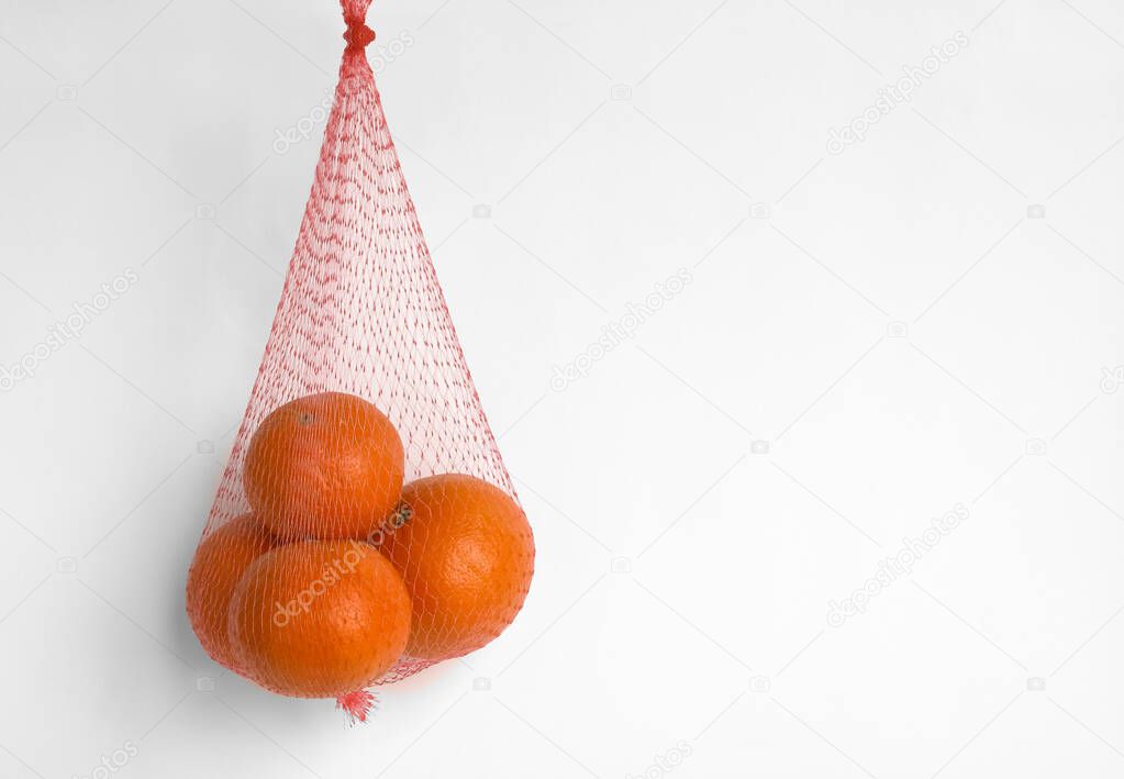 Tangerines in a grid on a white background