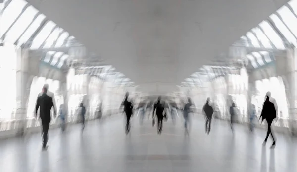 Abstract image of people in the lobby of the modern transport center of the airport bus and train station