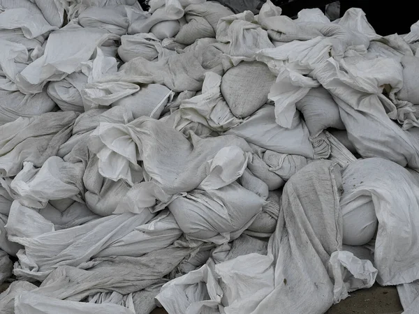 Heap of discarded cloth bags of trash