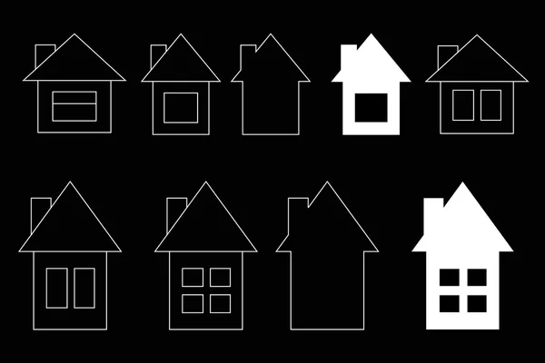 A set of silhouettes of houses on a black background — Stock Vector