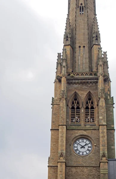 the tower of the demolished victorian square church in halifax west yorkshire next to the piece hall