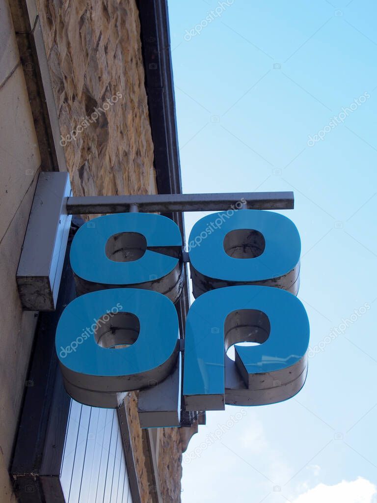 Hebden bridge, west yorkshire, united kingdom - 22 may 2021: sign above a coop supermarket in hebden bridge