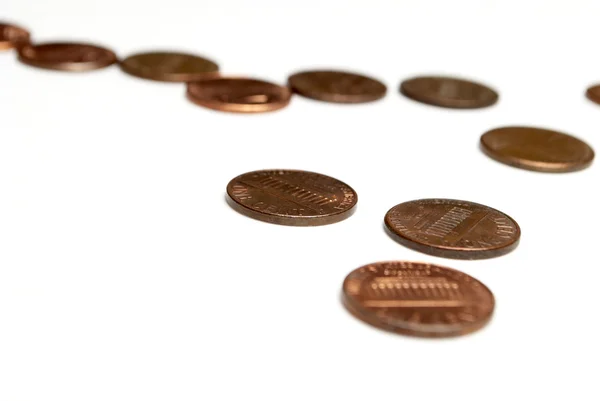 Peníze, mince na bílém pozadí — Stock fotografie