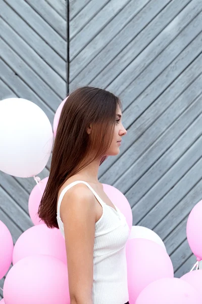 Side View Beautiful Brunette Girl Pink White Air Balloons Wooden — Stock Photo, Image