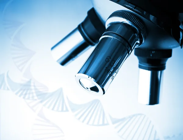 Microscopio e DNA — Foto Stock