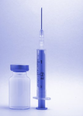 Medical syringe and phials clipart