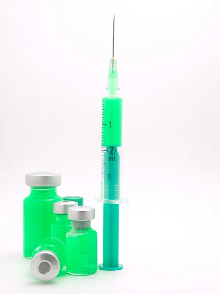 Medical syringe and phials — Stock Photo, Image