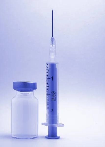 Medical syringe and phials — Stock Photo, Image