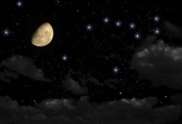 Gece gökyüzünde yıldızlar ve bir ay.