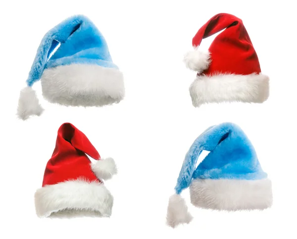 The red hat of Santa Claus in various positions — Stock Photo, Image