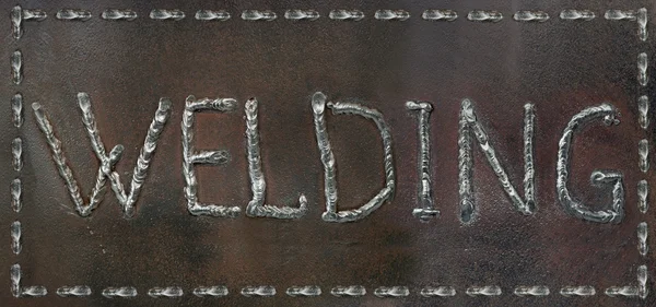 焊接的标题。焊缝形式的字母 — 图库照片