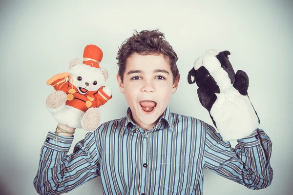 Teenager with plush puppets — Stock Photo, Image