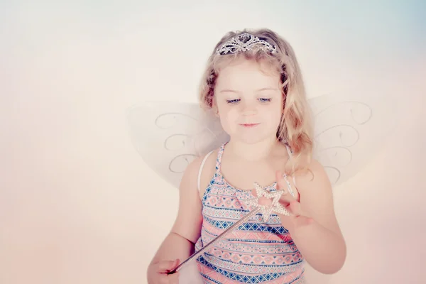 Beauty  little girl with magic wand — Stock Photo, Image