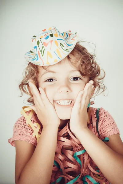 Gelukkig meisje met feest hoed — Stockfoto