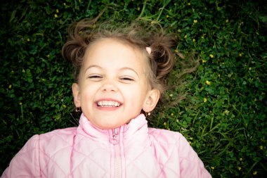 laughing on the grass