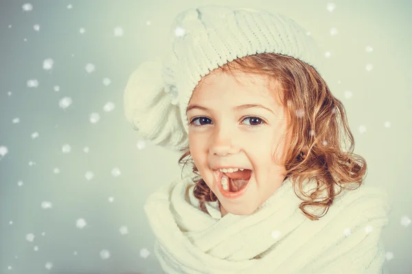 Happy little girl with hat and scarf — Stock Photo, Image