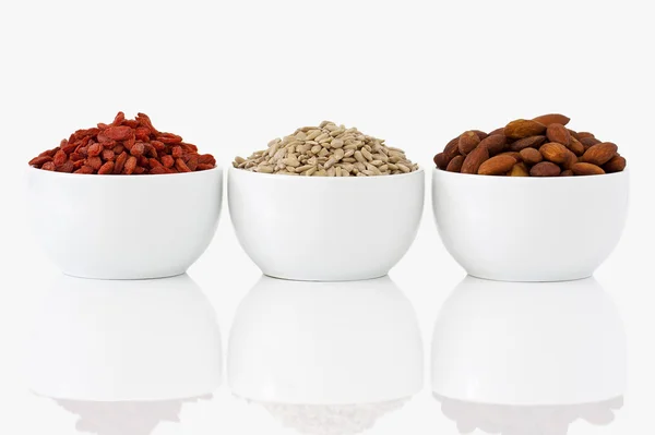 Almonds, sunflower seeds and goji berries — Stock Photo, Image