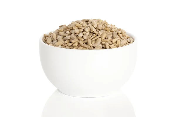 Sunflower seeds in a cup — Stock Photo, Image