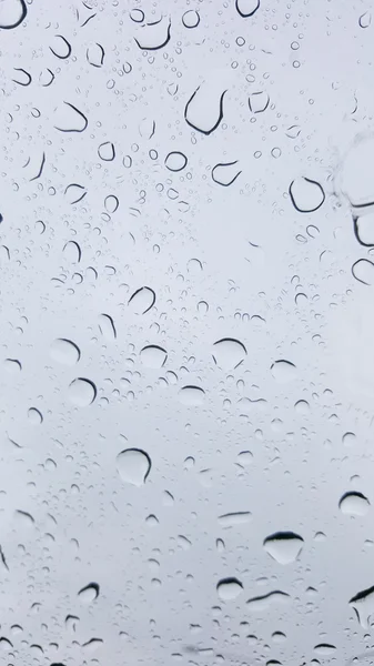 Gotas de agua sobre fondo gris — Foto de Stock