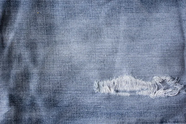 Çizgili desenli mavi kullanılmış kot pantolon, keten vintage arka plan