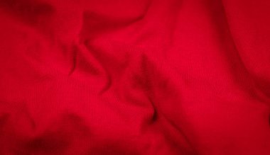 Kırmızı kırışık kumaş ve görünür detaylar. arkaplan