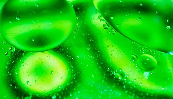 Oil Drops Water Green Background — Stock Photo, Image