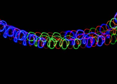 Siyah arkaplanda renkli çizgiler.