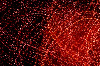 Siyah zemin üzerindeki kırmızı noktalı ışık çizgileri