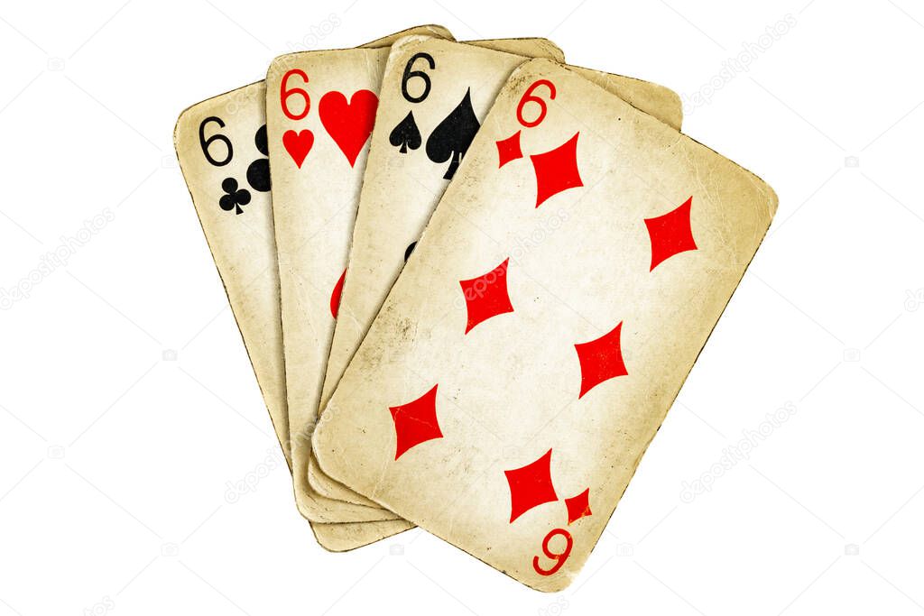 Four old dirty sixes poker cards on a white background