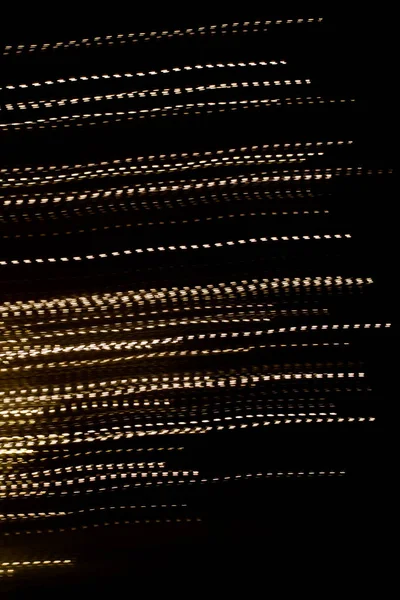 Goldene Gestrichelte Lichterketten Auf Schwarzem Hintergrund — Stockfoto