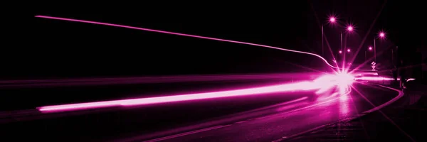 violet car lights at night. long exposure