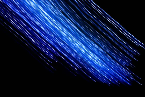 blue dashed lines of lights on a black background