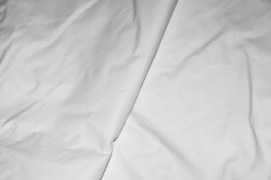 Pileli beyaz pamuklu kumaş. doku veya arkaplan