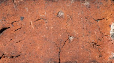 Görünür desenli kırmızı tuğlalı makro fotoğraf. arkaplan