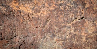 Turuncu bir tuğlanın görünür dokusu olan makro fotoğrafı. arkaplan