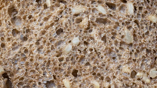 Ciemny Chleb Nasionami Słonecznika Tło Lub Tekstura — Zdjęcie stockowe