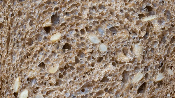 Pão Escuro Com Sementes Girassol Fundo Textura — Fotografia de Stock