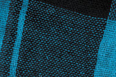 Mavi pamuklu kumaş görünür bir dokusu var.