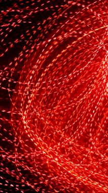 Siyah zemin üzerindeki kırmızı noktalı ışık çizgileri