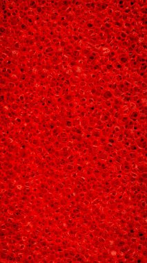 Kırmızı sünger ve görünür detaylar. arkaplan veya doku