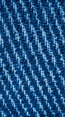 Beyaz ve mavi pamuklu kumaş görünür bir dokusu var.