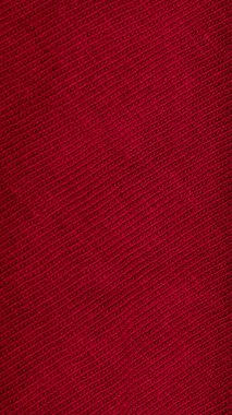 Kırmızı pamuklu kumaş ve görünür detaylar. arkaplan veya doku