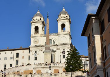 Rome, Italy. Oct 13, 2019. Church of the Santissima Trinita dei Monti with the Obelisco Sallustiano and the Spanish Steps close to Piazza di Spagna.