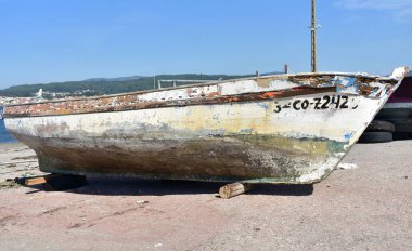 Portosin, Spain. September 11, 2020. Old galician wooden rowboat in a harbor. Coruna Province, Rias Baixas, Galicia Region.