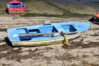 Portosin, Spain. September 11, 2020. Old galician wooden rowboat in a harbor. Coruna Province, Rias Baixas, Galicia Region.